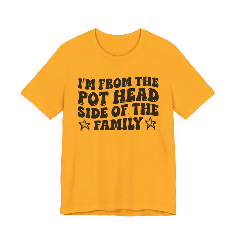 light t-shirt with ‘I’M FROM THE POT HEAD SIDE OF THE FAMILY’ statement text in bold outline lettering, front flat-lay view.