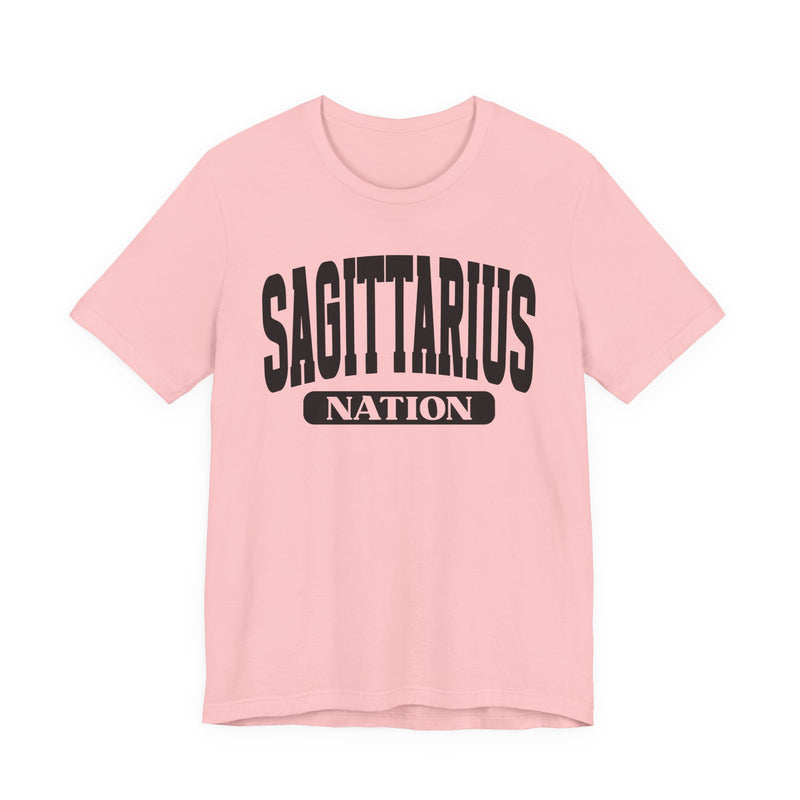 Charity Pink t-shirt with black arched SAGITTARIUS collegiate lettering and NATION banner print, front flat-lay view.