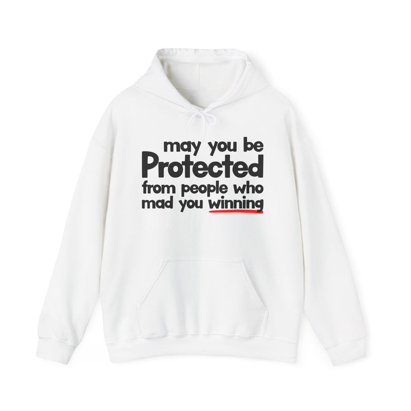 May You Be Protected From People Who Mad You Winning — Hoodie fabric detail close-up: MAY YOU BE PROTECTED FROM PEOPLE WHO MAD YOU WINNING in bold statement lettering. Street Talk Designs protection statement apparel.