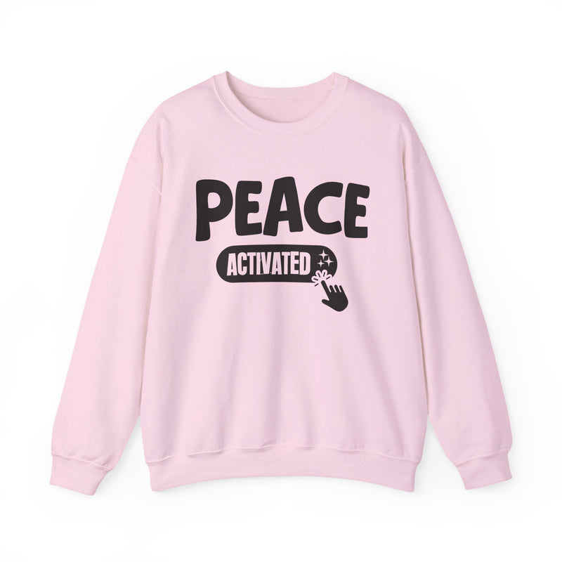 Sweatshirt in Light Pink with lettering reading "PEACE ACTIVATED", front view.