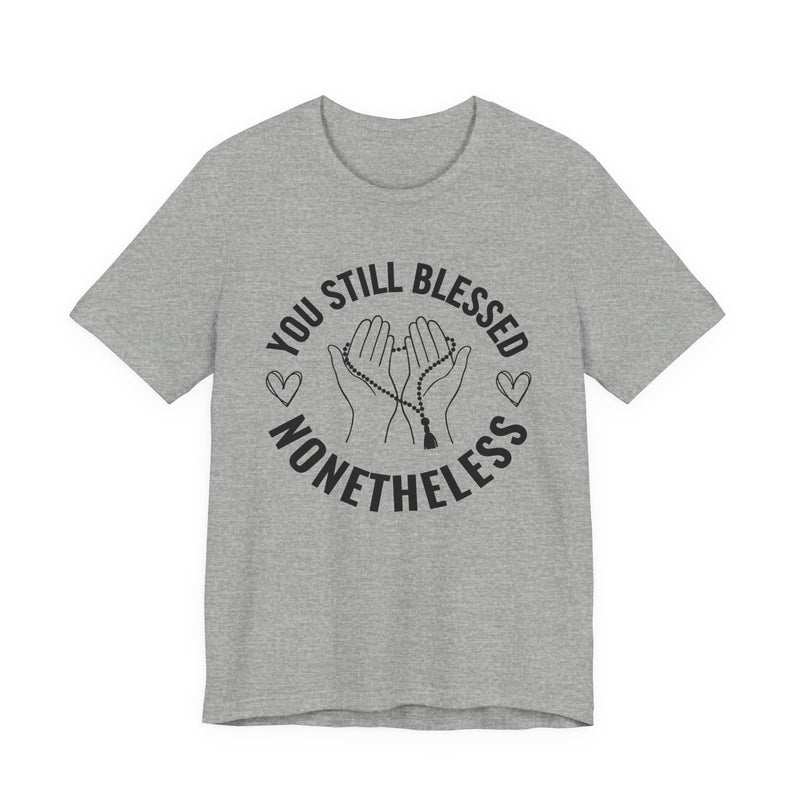 T-Shirt with “YOU STILL BLESSED NONETHELESS” statement print