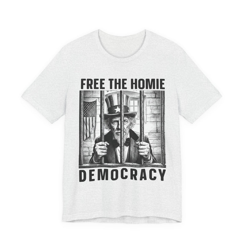 Free The Homie Democracy — T-Shirt fabric detail close-up: FREE THE HOMIE DEMOCRACY in bold statement lettering. Street Talk Designs politics and power statement apparel.