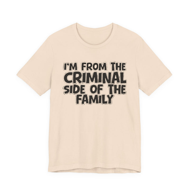 Natural t-shirt with 'I'M FROM THE CRIMINAL SIDE OF THE FAMILY' in black hand-drawn bubble lettering on the chest, front flat-lay mockup view.