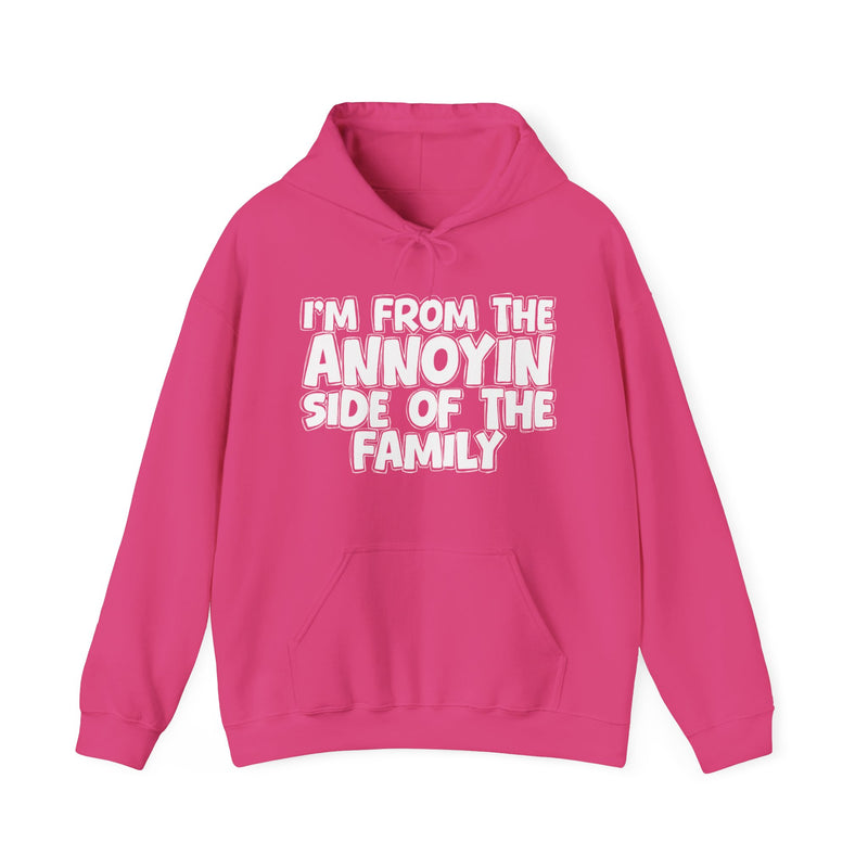 light hoodie with ‘I’M FROM THE ANNOYIN SIDE OF THE FAMILY’ statement text in bold outline lettering, front flat-lay view.