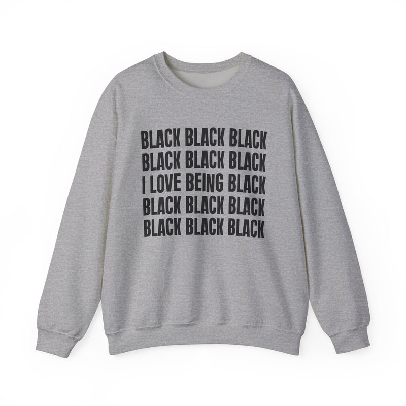 Sport Grey sweatshirt with stacked ‘BLACK BLACK BLACK / I LOVE BEING BLACK / BLACK BLACK BLACK’ block text graphic in dark-contrast print, front flat-lay mockup view