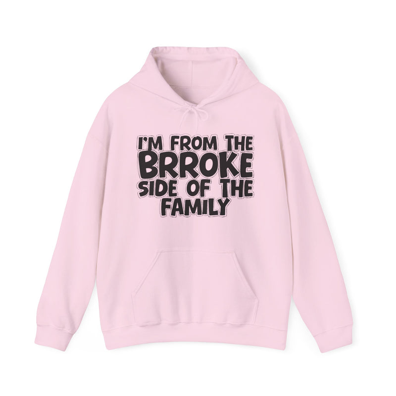 Light Pink hoodie with 'I'M FROM THE BRROKE SIDE OF THE FAMILY' in black hand-drawn bubble lettering on the chest, front flat-lay mockup view.