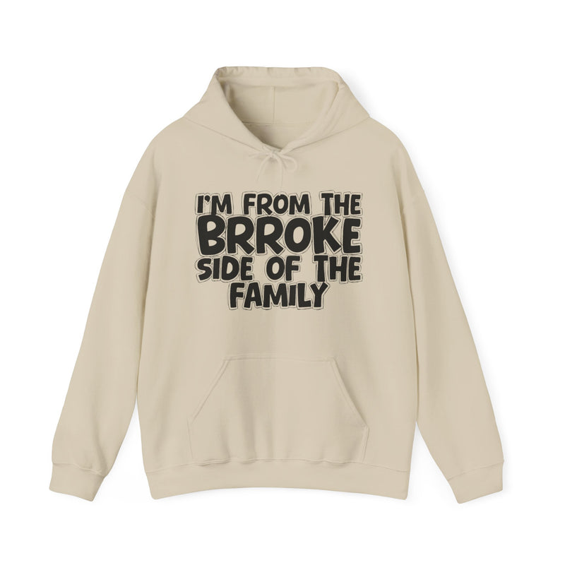 Sand hoodie with 'I'M FROM THE BRROKE SIDE OF THE FAMILY' in black hand-drawn bubble lettering on the chest, front flat-lay mockup view.
