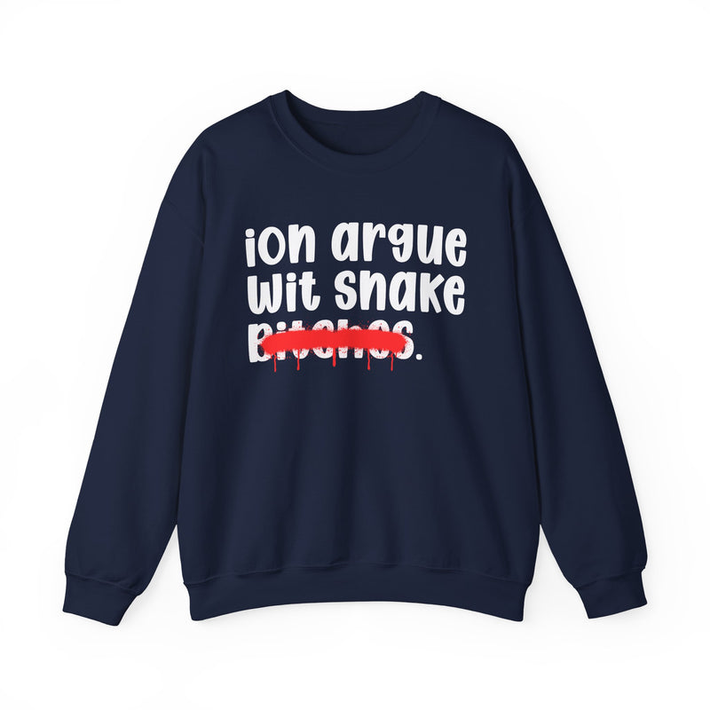 Navy sweatshirt with white printed statement graphic, front view: 'ion argue' and 'Wit snake' in rounded chunky lowercase lettering over distressed 'Bitches.' crossed by a red spray-paint strike with paint drips.