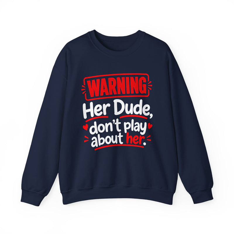 Warning — Her Dude Don’t Play About Her — Sweatshirt fabric detail close-up: lettering reading 'WARNING - HER DUDE DON’T PLAY ABOUT HER'. Street Talk Designs family statement apparel.
