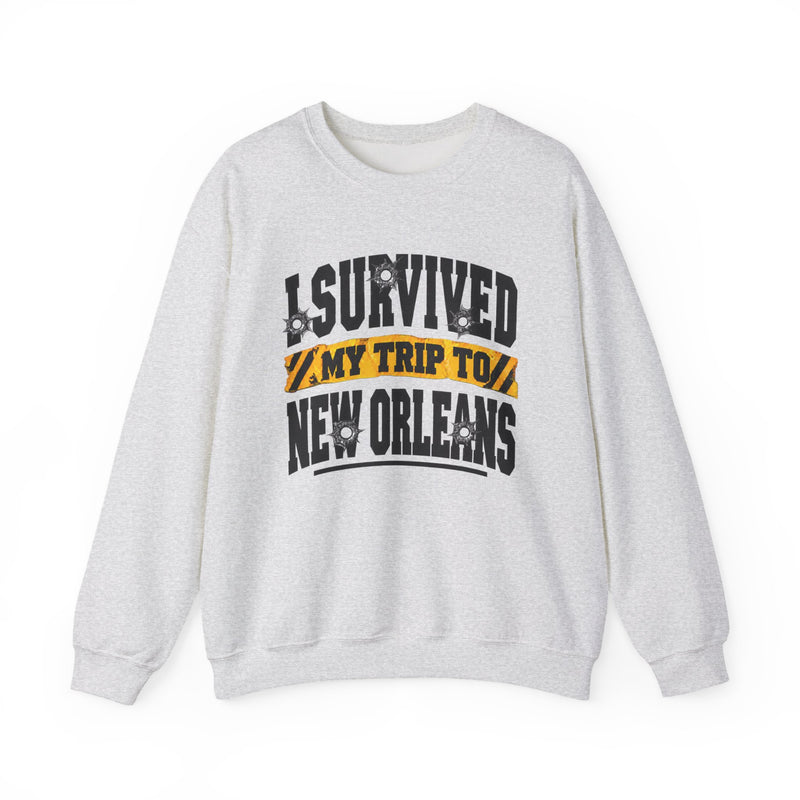 Sweatshirt product with collegiate lettering reading I SURVIVED MY TRIP TO NEW ORLEANS, flat lay.
