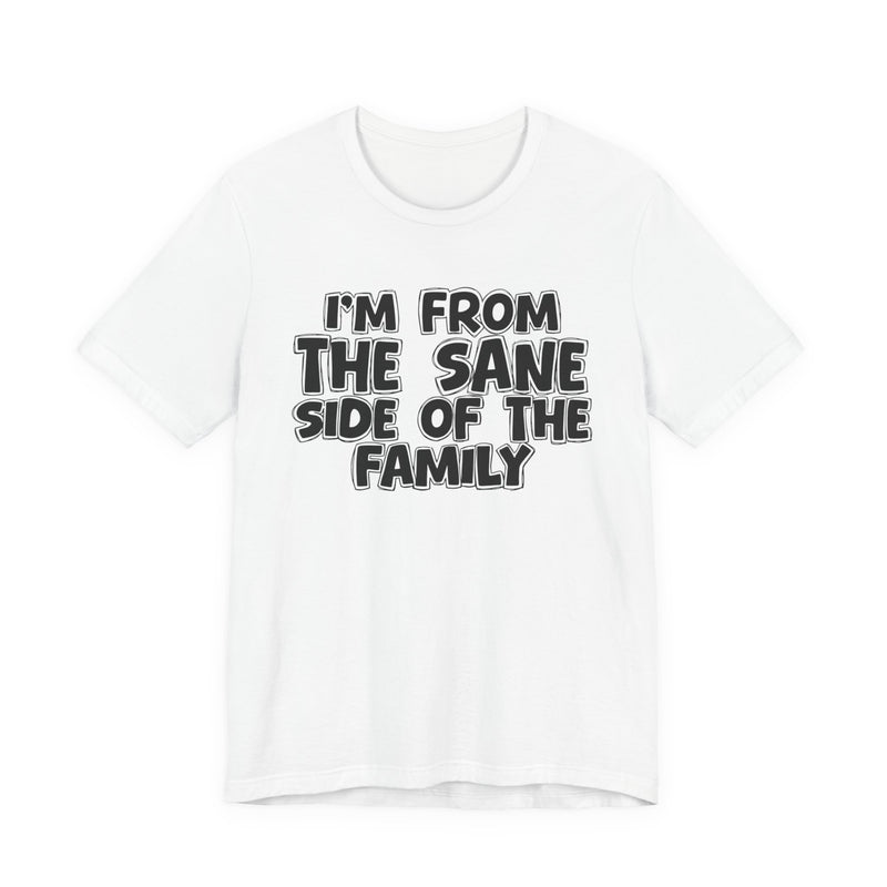 White t-shirt, printed with the "I'M FROM THE SANE SIDE OF THE FAMILY" statement in bold outlined bubble lettering, front flat-lay view.