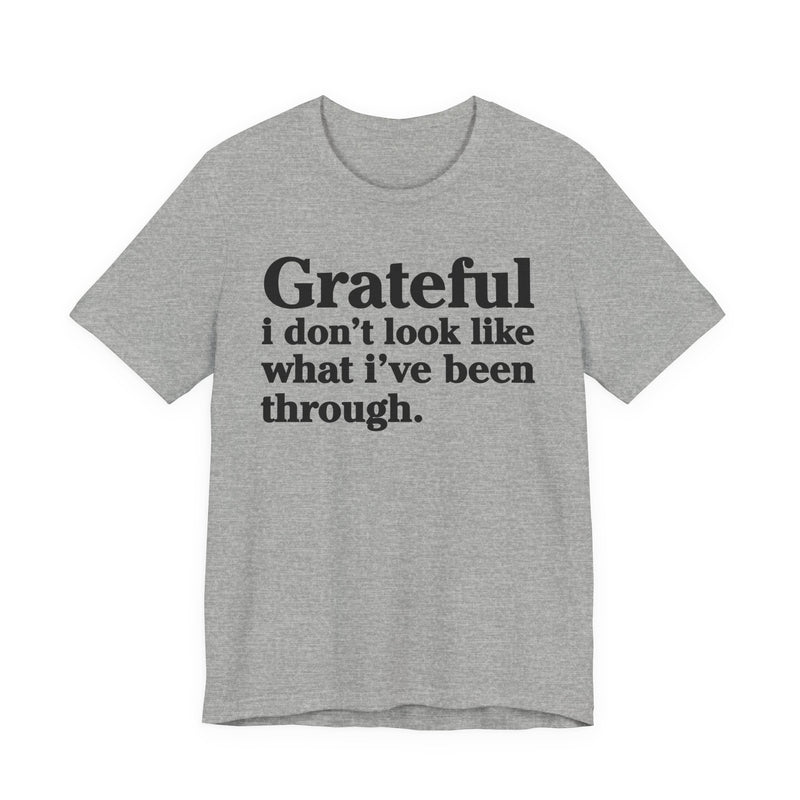 Grateful I Don't Look Like What I've Been Through — Positive Christian T-Shirt