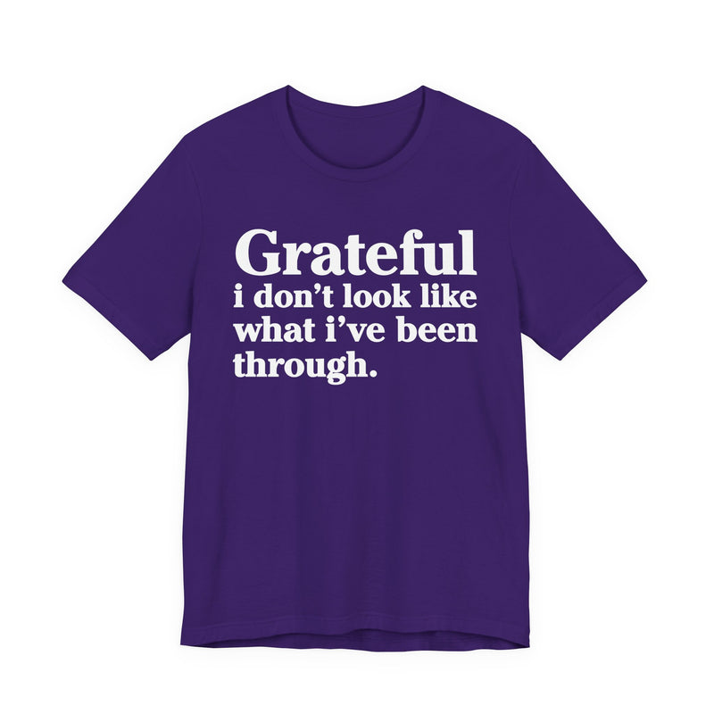 Grateful I Don't Look Like What I've Been Through — Positive Christian T-Shirt