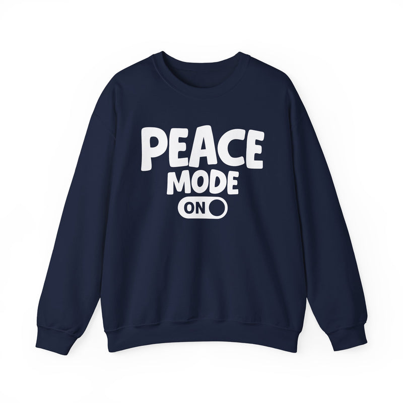 Navy-color sweatshirt with white bubble lettering reading PEACE MODE ON, front.