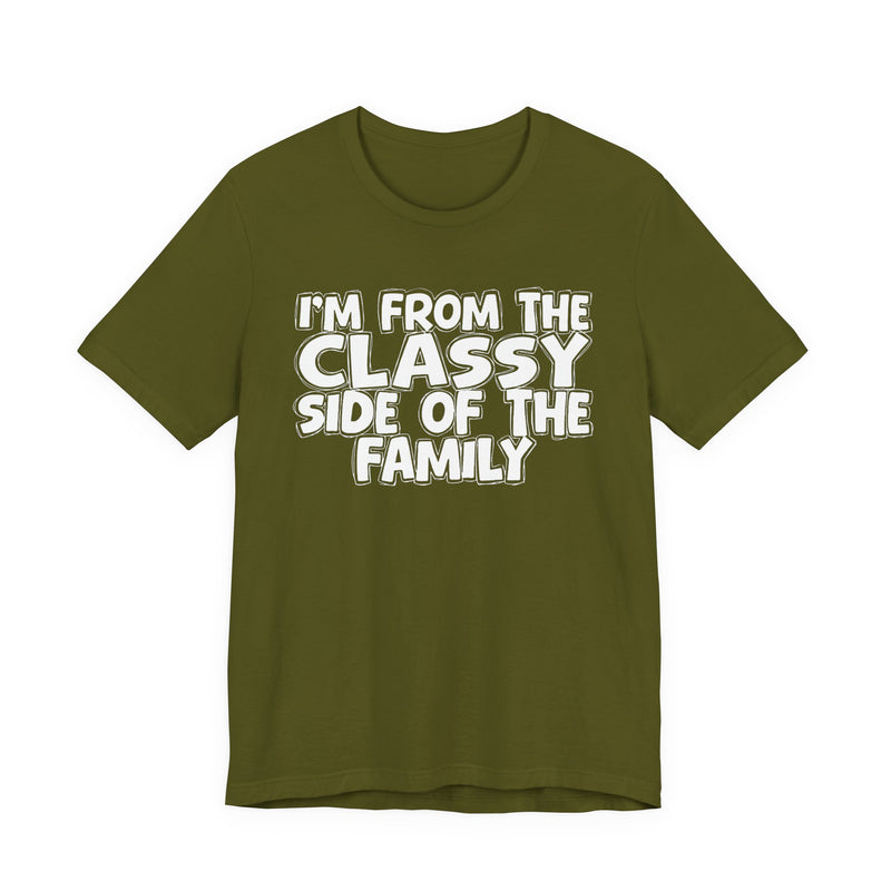 Olive t-shirt with 'I'M FROM THE CLASSY SIDE OF THE FAMILY' in white hand-drawn bubble lettering on the chest, front flat-lay mockup view.