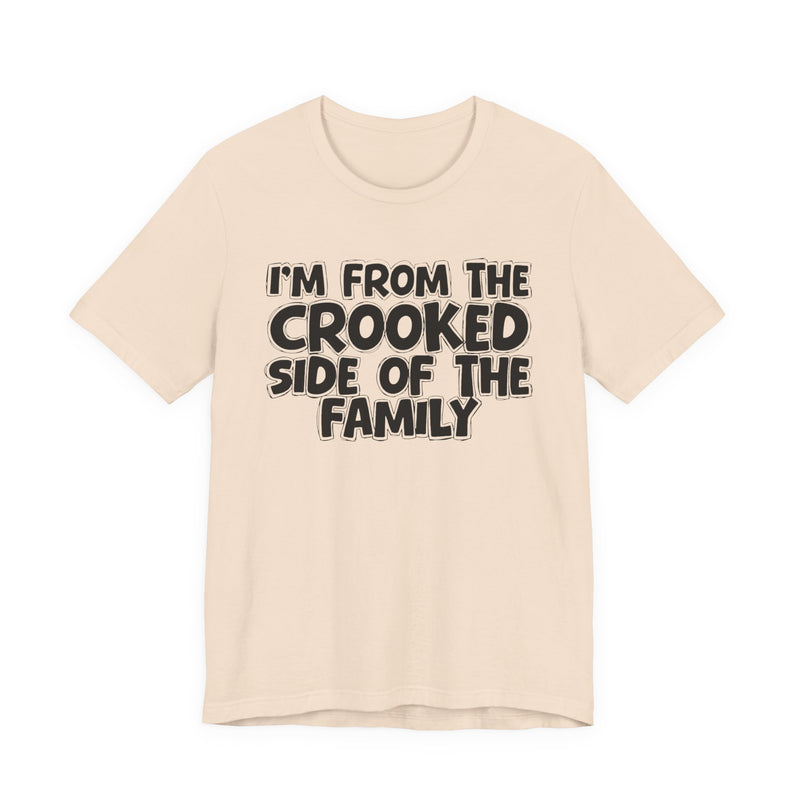 Soft Cream t-shirt, printed with the "I'M FROM THE CROOKED SIDE OF THE FAMILY" statement in bold outlined bubble lettering, front flat-lay view.