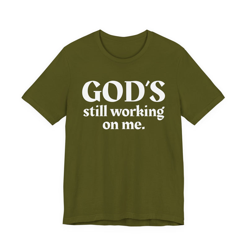 God's Still Working On Me — Christian T-Shirt