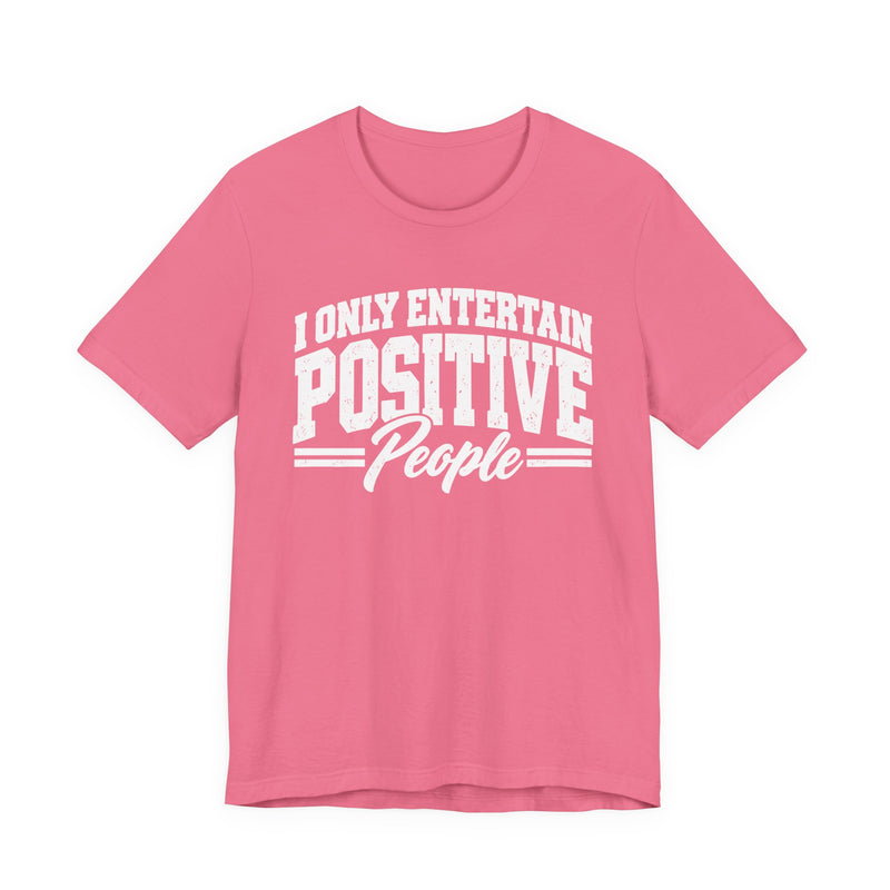 T-Shirt in Charity Pink with lettering reading "I ONLY ENTERTAIN POSITIVE PEOPLE", front view.