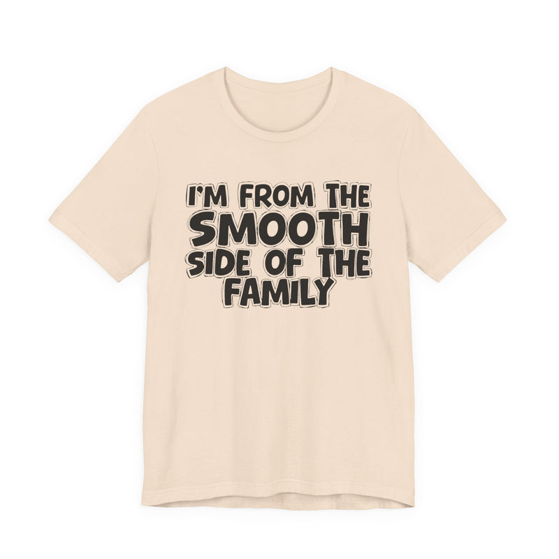 Soft Cream t-shirt, printed with the "I'M FROM THE SMOOTH SIDE OF THE FAMILY" statement in bold outlined bubble lettering, front flat-lay view.