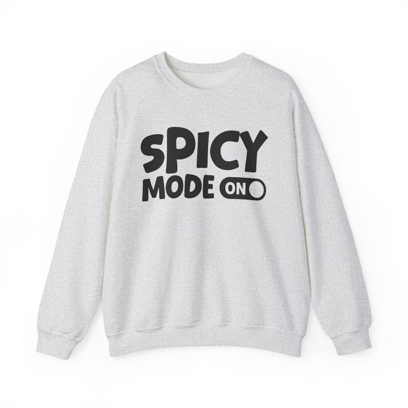 Cream sweatshirt with white bold distressed lettering reading SPICY MODE ON, flat-lay view.
