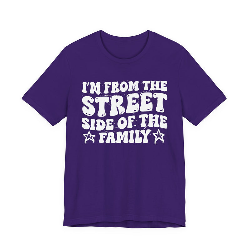 Team Purple t-shirt with white outlined bubble lettering reading 'I'M FROM THE STREET SIDE OF THE FAMILY', front flat-lay view.