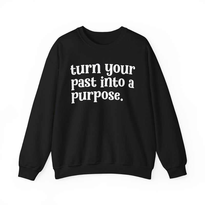 Black sweatshirt with white "turn your past into a purpose." lettering, front view.