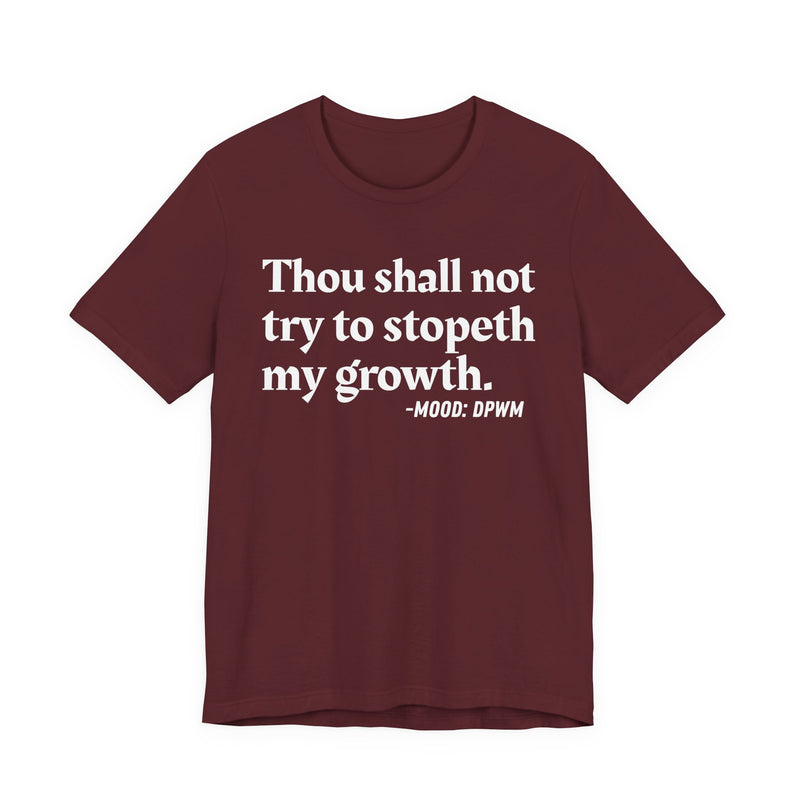 T-Shirt with “THOU SHALL NOT TRY TO STOPETH MY GROWTH” statement print