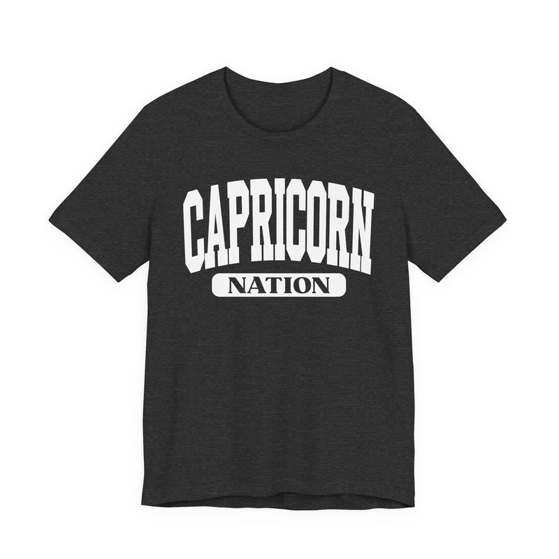 Dark Grey Heather t-shirt with white arched CAPRICORN lettering and a NATION pill badge, front view.