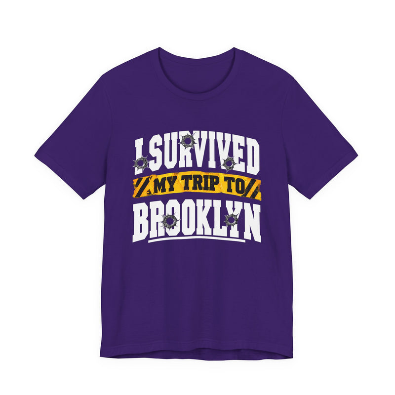 T-Shirt with collegiate lettering reading I SURVIVED MY TRIP TO BROOKLYN, front view.