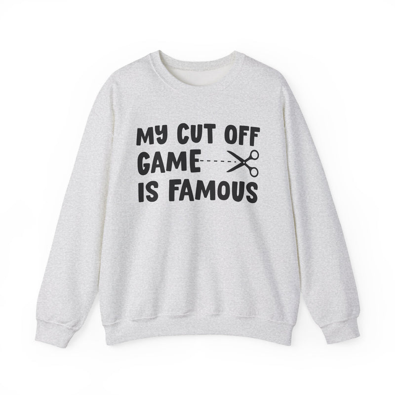 Natural sweatshirt with black bold statement lettering reading MY CUTOFF GAME IS FAMOUS, front flat-lay view.