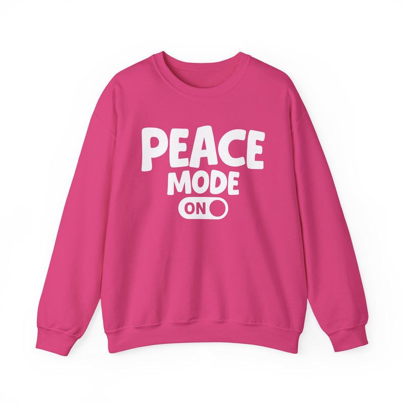 Hot pink-color sweatshirt with white bubble lettering reading PEACE MODE ON, front.