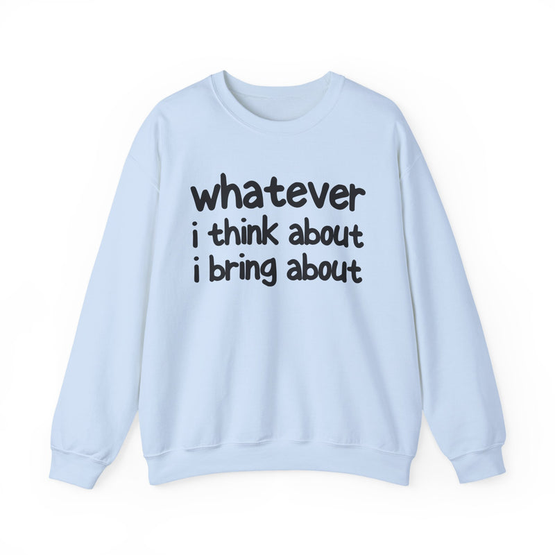 White sweatshirt with dark bold manifestation lettering reading WHATEVER I THINK ABOUT I BRING ABOUT, front flat-lay view.