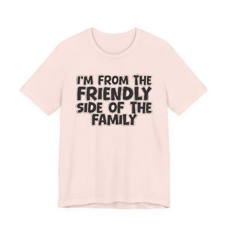 Gold t-shirt with white bubble lettering reading I'M FROM THE FRIENDLY SIDE OF THE FAMILY, front flat-lay view.
