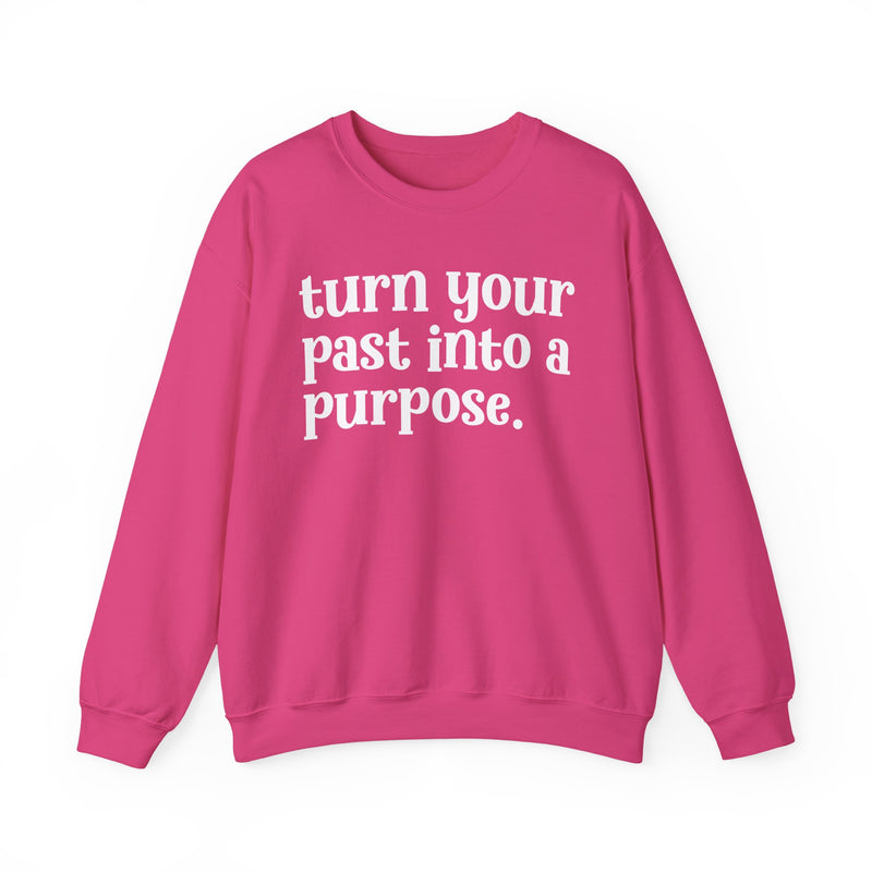 Heliconia sweatshirt with white "turn your past into a purpose." lettering, front view.
