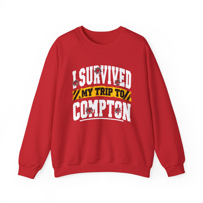 Sweatshirt with collegiate lettering reading I SURVIVED MY TRIP TO COMPTON, front view.