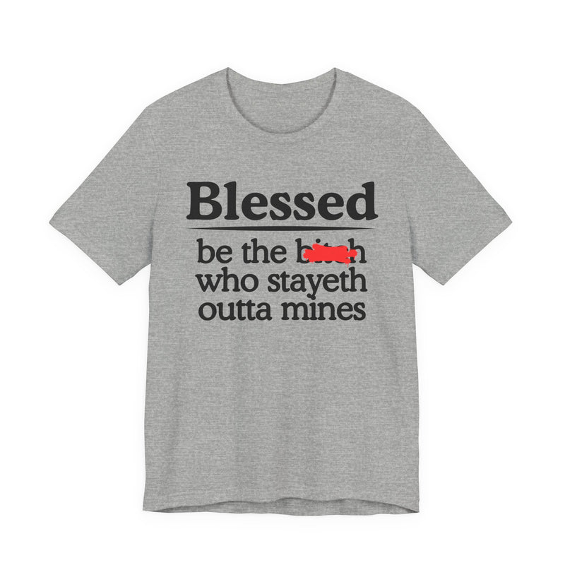 Athletic Heather tee with black and white serif lettering reading "Blessed be the b—h who stayeth outta mines", front flat-lay view, with a red redaction mark over the middle word.