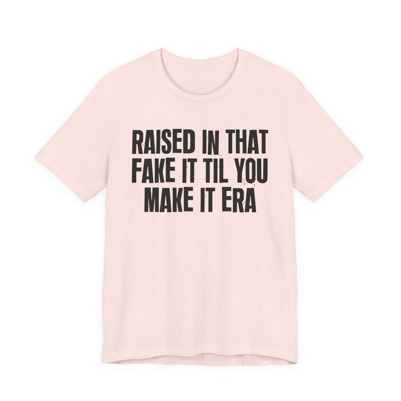 T-Shirt product with lettering reading "RAISED IN THAT FAKE IT TIL YOU MAKE IT ERA", alternate view.