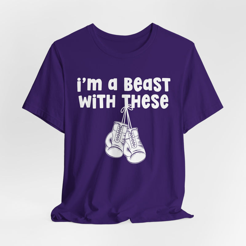 Charcoal t-shirt with boxing gloves and white collegiate lettering reading I'M A BEAST WITH THESE, flat-lay view.
