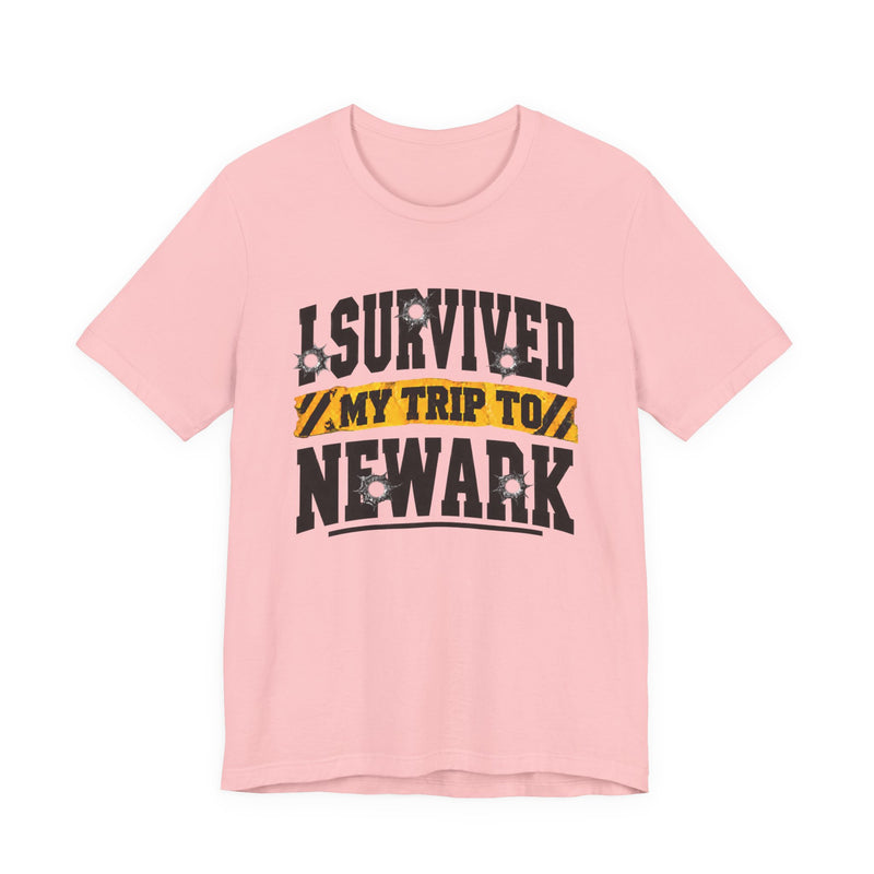 T-Shirt with collegiate lettering reading I SURVIVED MY TRIP TO NEWARK, front view.