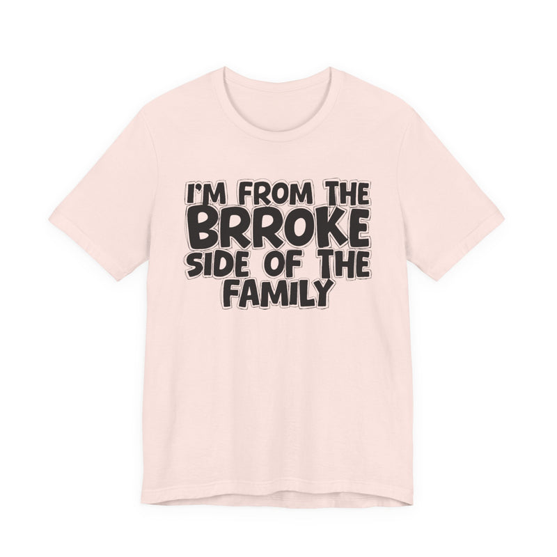 Soft Cream t-shirt with 'I'M FROM THE BRROKE SIDE OF THE FAMILY' in black hand-drawn bubble lettering on the chest, front flat-lay mockup view.