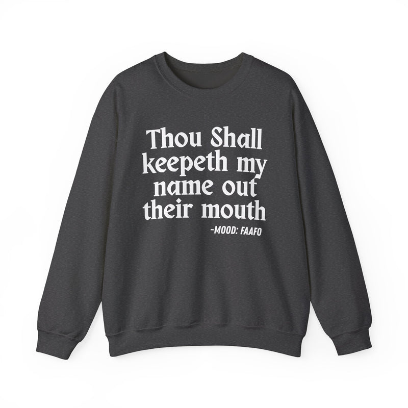 Sweatshirt with text design reading “THOU SHALL KEEPETH MY NAME OUT THEIR MOUTH”, front view