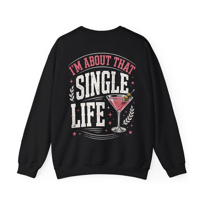 Black-color sweatshirt with pink and white lettering reading I'M ABOUT THAT SINGLE LIFE, flat product.