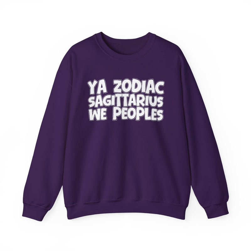 Purple sweatshirt with white hand-lettered YA ZODIAC SAGITTARIUS WE PEOPLES print, front flat-lay view.