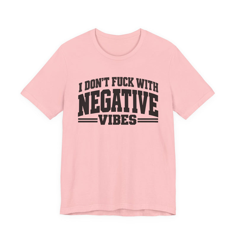 T-shirt in Pink with lettering reading "I Don't Fuck With Negative Vibes", front view.
