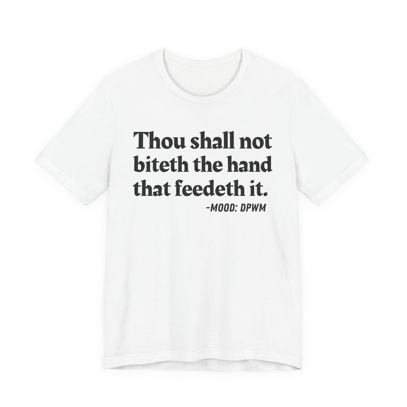 T-Shirt with text design reading “THOU SHALL NOT BITETH THE HAND THAT FEEDETH IT”, front view