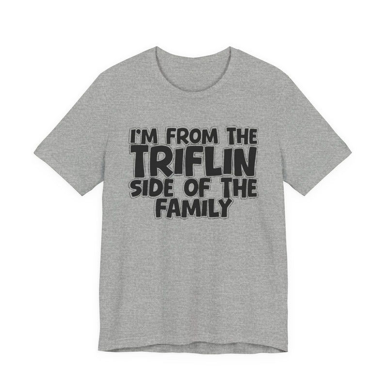 Athletic Heather t-shirt with "I'M FROM THE FAKE SIDE OF THE FAMILY" in bold black outlined bubble lettering, front flat-lay view