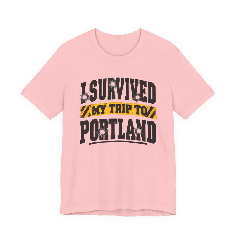 T-Shirt with collegiate lettering reading I SURVIVED MY TRIP TO PORTLAND, front view.