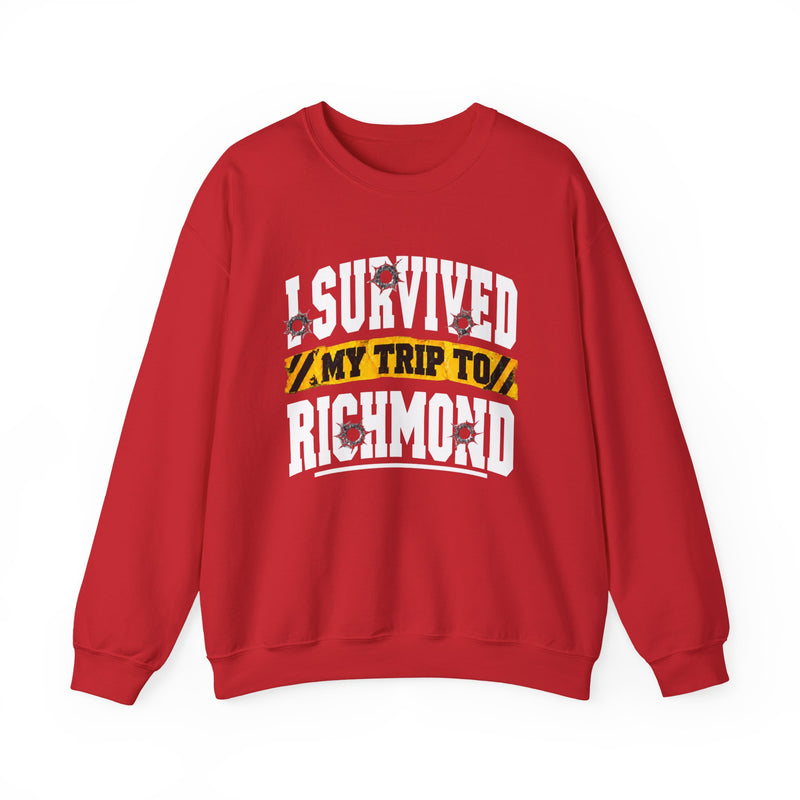 Sweatshirt product photo with arched collegiate lettering reading "I SURVIVED" with bullet-hole decals, a caution-tape band reading "MY TRIP TO", and large block letters reading "RICHMOND", front view.