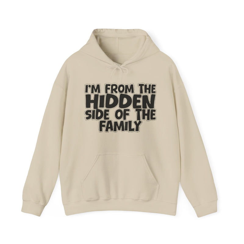 Black hoodie with white bubble lettering reading I'M FROM THE HIDDEN SIDE OF THE FAMILY, front flat-lay view.