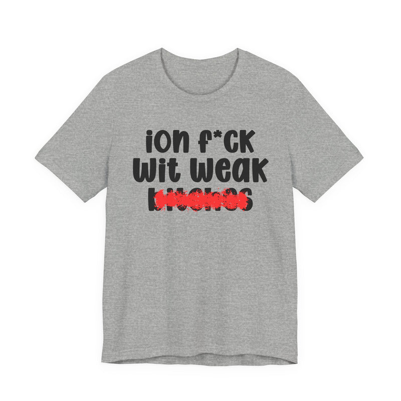 Ash t-shirt with black "ion f*CK Wit Weak bitches" statement graphic and red marker strike-through over the bottom word, front flat-lay on white background.